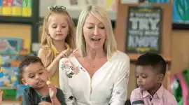 teacher with young students