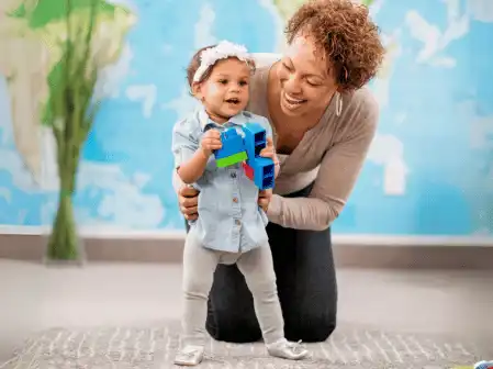 teacher with young child