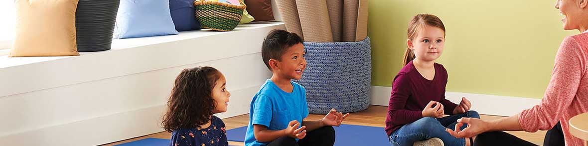 Preschool children doing yoga