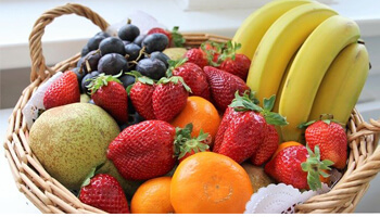 Basket filled with various fruit