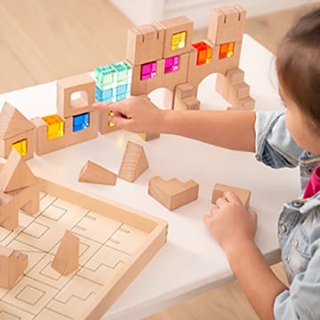 Child playing with Gem Blocks