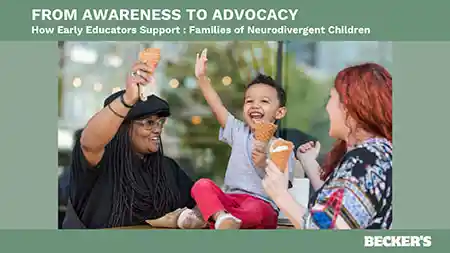Preschool child eating ice cream with two women